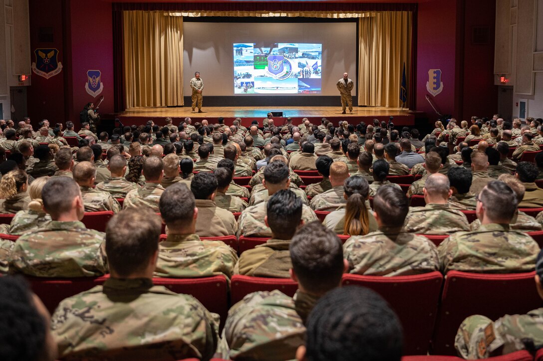 Maj. Gen. Andrew Gebara, 8th Air Force and Joint-Global Strike Operations Center commander, and Chief Master Sgt. Steve Cenov, 8th Air Force command chief and J-GSOC senior enlisted leader, host an All-Call at Ellsworth Air Force Base, S.D., Oct. 17, 2022. During the visit, 8th Air Force leaders spoke with Airmen across the 28th Bomb Wing to better understand their needs as Ellsworth prepares for and takes on the B-21 Raider mission.(U.S. Air Force photo by Staff Sgt. Alexi Bosarge)