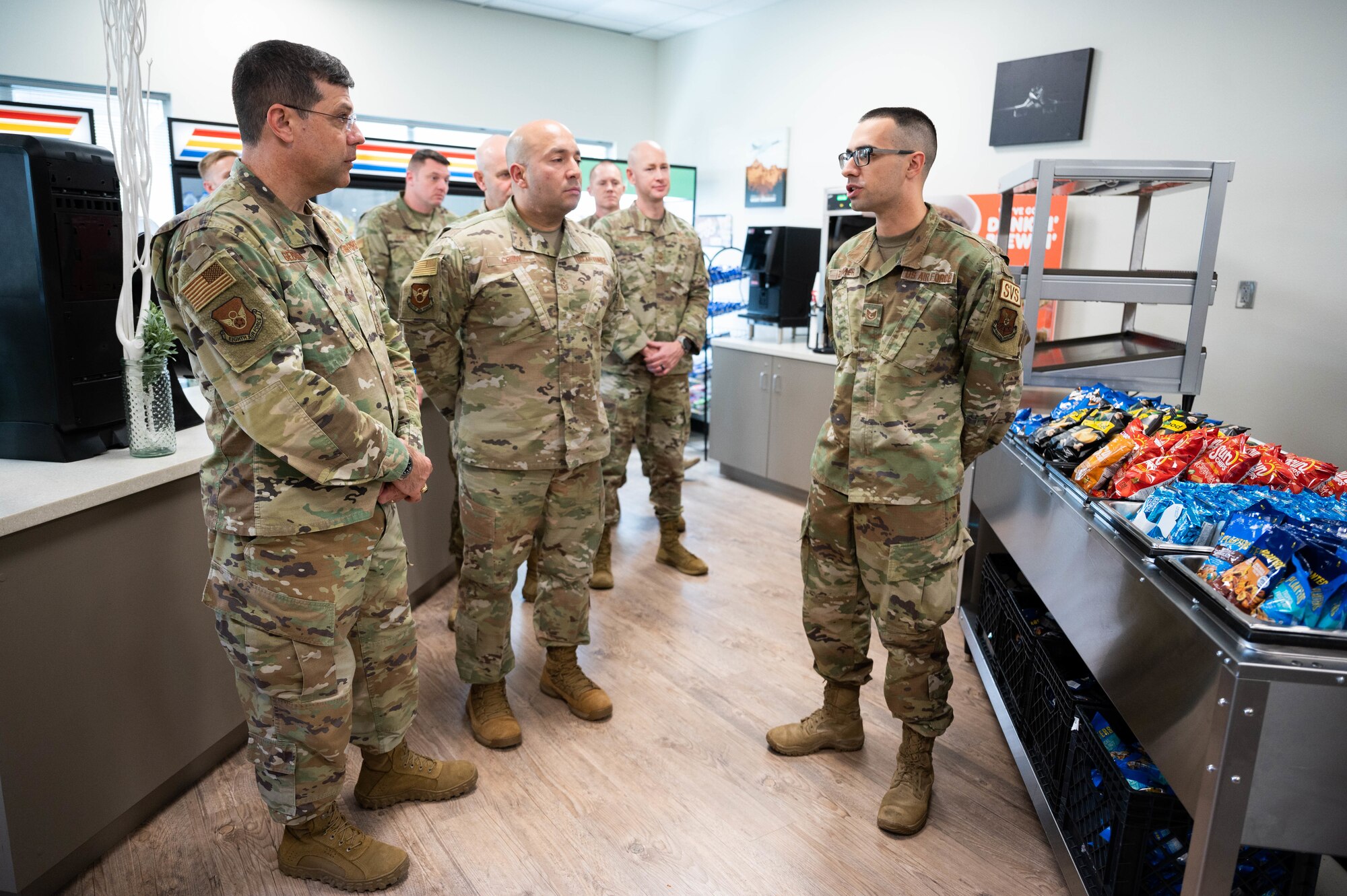 Maj. Gen. Andrew Gebara, left, 8th Air Force and Joint-Global Strike Operations Center commander, and Chief Master Sgt. Steve Cenov, center, 8th Air Force command chief and J-GSOC senior enlisted leader, are briefed by a member of the 28th Bomb Wing at Ellsworth Air Force Base, S.D., Oct. 17, 2022. Members of Ellsworth showcased significant contributions to the long-range strike mission and how they continue to maintain readiness and innovate.(U.S. Air Force photo by Staff Sgt. Alexi Bosarge)