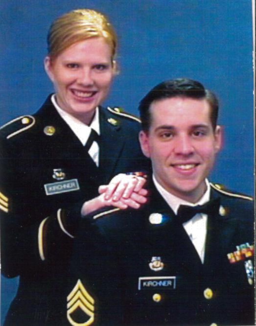 Roger Kirchner poses with is wife Carla in their Army Service Uniforms. Both Roger and Carla were members of the 135th Army Band.
