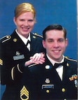 Roger Kirchner poses with is wife Carla in their Army Service Uniforms. Both Roger and Carla were members of the 135th Army Band.