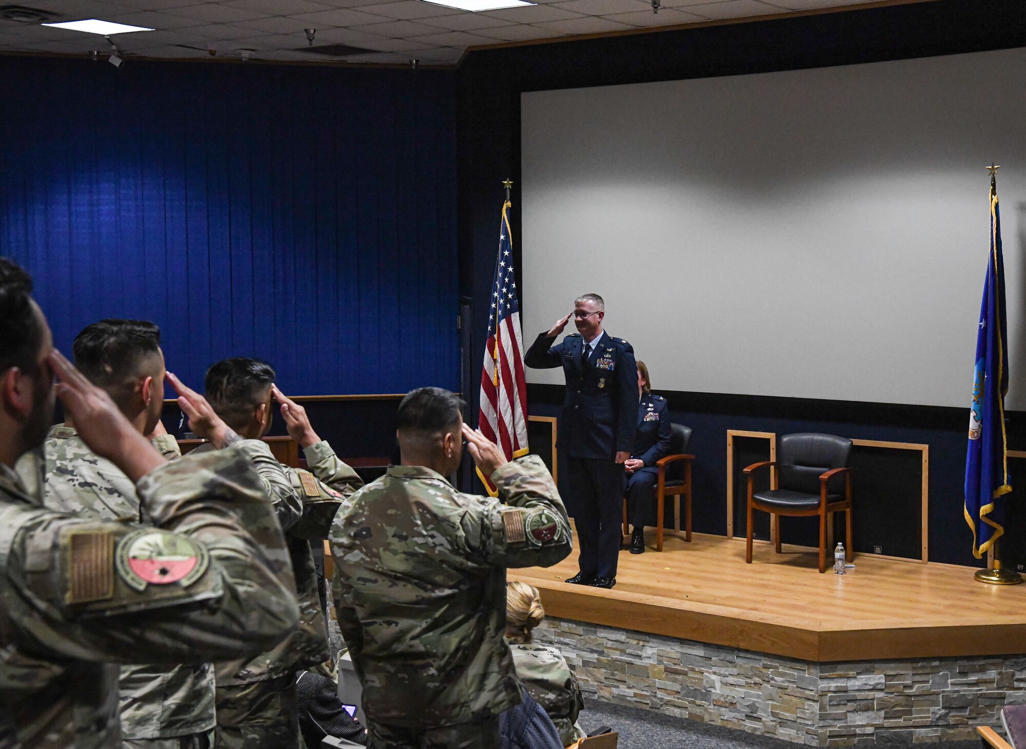 Airmen of the 433rd Security Forces Squadron render their first salute to the incoming commander, Maj. Mark Howard, during an assumption of command ceremony at Joint Base San Antonio-Lackland, Texas, Oct. 15, 2022. The assumption of command ceremony marks a formal passing of responsibility, authority and accountability of command. (U.S. Air Force photo by Staff Sgt. Adriana Barrientos)