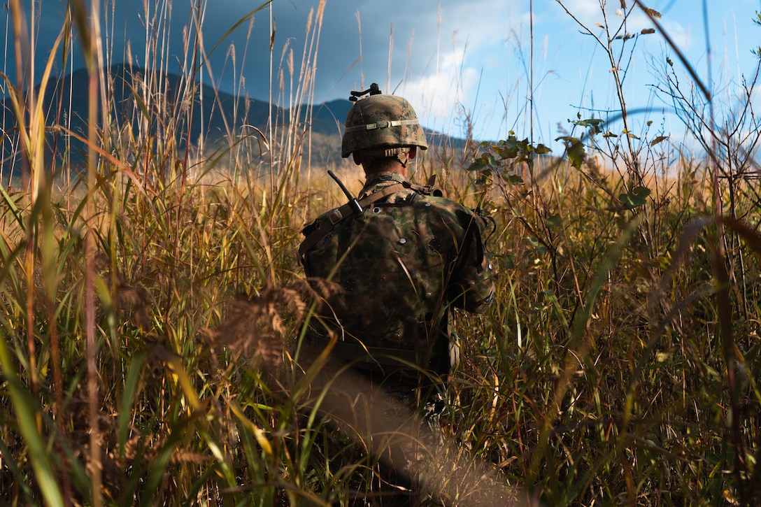 A U.S. Marine with 3rd Battalion, 3rd Marines, 3rd Marine Division, participates in bilateral force-on-force training during Resolute Dragon 22 at Kamifurano Maneuver Area, Hokkaido, Japan, Oct. 12, 2022. Resolute Dragon 22 is an annual bilateral exercise designed to strengthen the defensive capabilities of the U.S.-Japan Alliance by exercising integrated command and control, targeting, combined arms, and maneuver across multiple domains.