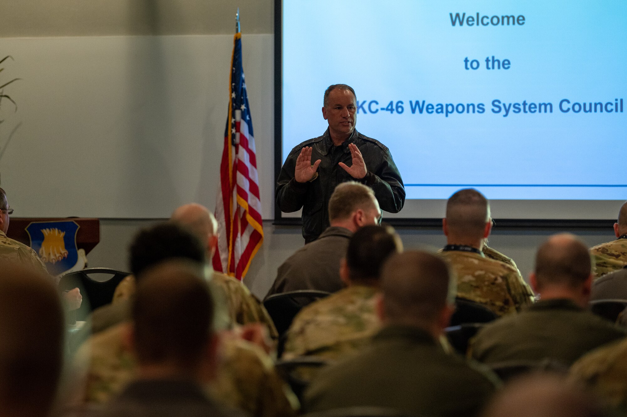 Colonel Nate Vogel, 22nd Air Refueling Wing commander, greets the KC-46 Weapons Systems Council Oct. 18, 2022, at McConnell Air Force Base, Kansas.