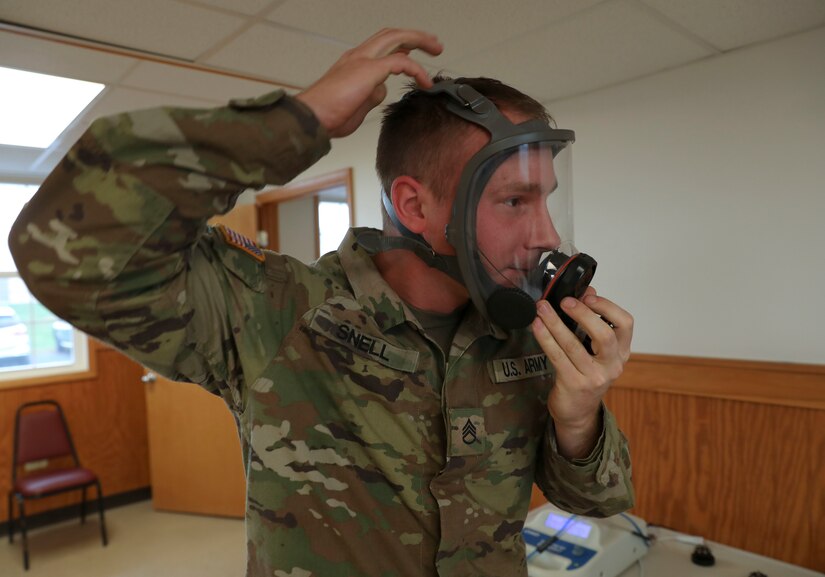 Staff Sgt. Luther Eugene Snell Jr., an aircraft mechanic with the 2nd Battalion, 104th Aviation Regiment, 28th Expeditionary Combat Aviation Brigade, 28th Infantry Division, Pennsylvania Army National Guard, tests a respirator that protect workers against hazards Oct. 19, 2022, at Fort Indiantown Gap, Pa., as part of the Technician Occupational Medical Surveillance Program. Federal technicians in the Pennsylvania National Guard who are exposed or potentially exposed to occupational hazards are enrolled in the program and evaluated annually in their birth month.