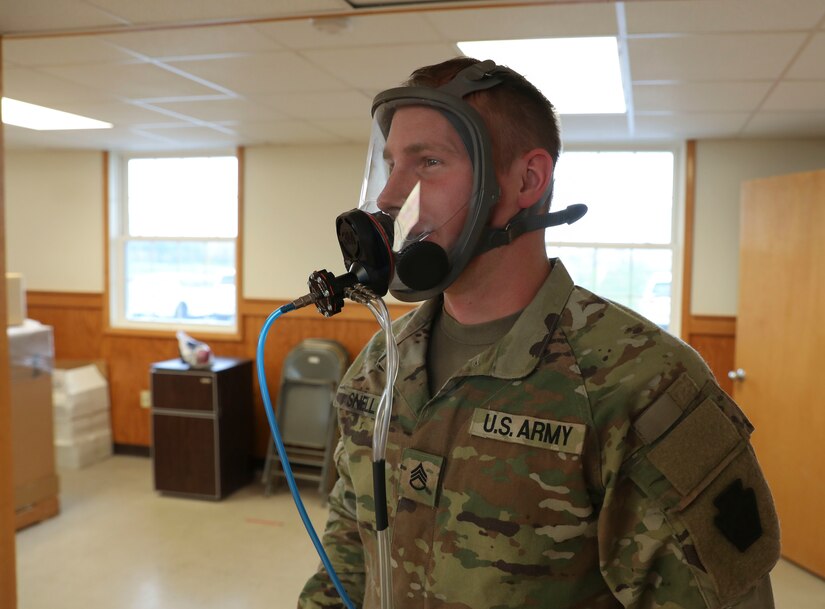 Staff Sgt. Luther Eugene Snell Jr., an aircraft mechanic with the 2nd Battalion, 104th Aviation Regiment, 28th Expeditionary Combat Aviation Brigade, 28th Infantry Division, Pennsylvania Army National Guard, tests a respirator that protect workers against hazards Oct. 19, 2022, at Fort Indiantown Gap, Pa., as part of the Technician Occupational Medical Surveillance Program. Federal technicians in the Pennsylvania National Guard who are exposed or potentially exposed to occupational hazards are enrolled in the program and evaluated annually in their birth month.