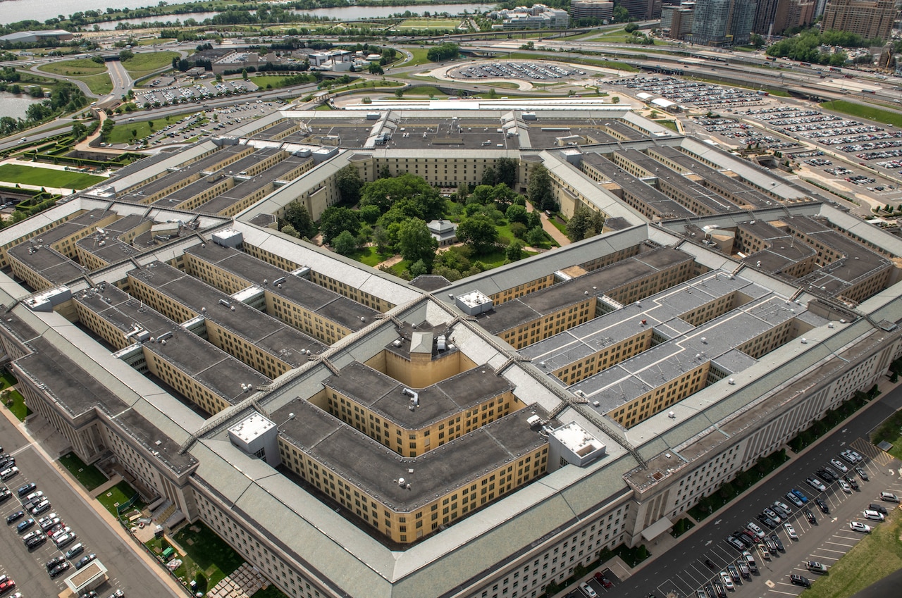 A photo shows a five-sided building.