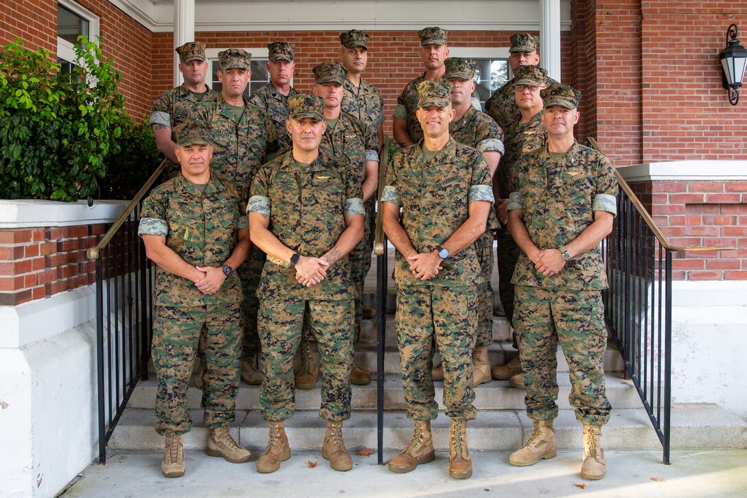 Marine Corps Installations East (MCIEAST) leadership pose for a photo during the MCIEAST Commander’s Conference at the Paradise Point Officers Club on Marine Corps Base Camp Lejeune, North Carolina, Oct. 17, 2022. The conference was held as an avenue for MCIEAST staff to foster an understanding of the circumstances, conditions, and intentions of the command with the installations' respective commanders. (U.S. Marine Corps photo by Cpl. Alexis Sanchez)