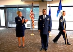 Col. Michelle Van Sickle, 433rd Medical Group commander, claps during the 433rd Medical Squadron assumption of command ceremony Oct. 16, 2022, where Col. Alvin Bradford assumed command, Joint Base San Antonio-Lackland, Texas. (U.S. Air Force photo by Staff Sgt. Monet Villacorte)