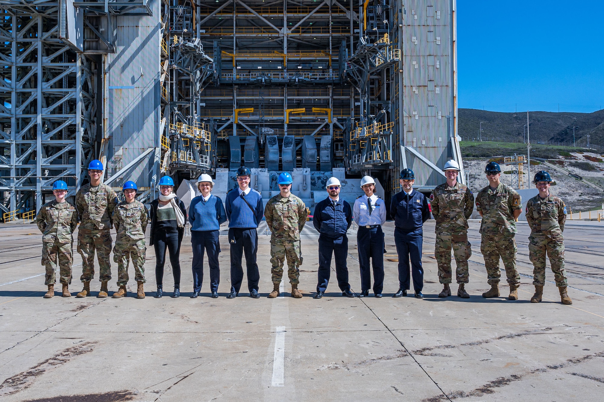 Members from the 18 Space Defense Squadron (18 SDS), France’s Operational Center for Military Surveillance of Space Objects (COSMOS), and the 2nd Space Launch Squadron conduct a tour of Space Launch Complex-6 during an Operator Exchange event, hosted by the 18 SDS, at Vandenberg Space Force Base, Calif. Oct. 6, 2022. The 4-day event aimed to advance global space domain awareness between the two groups by exchanging common practices, spotlighting mission capabilities, and explaining methodologies of their respective programs. (U.S. Space Force phot by Tech. Sgt. Luke Kitterman)