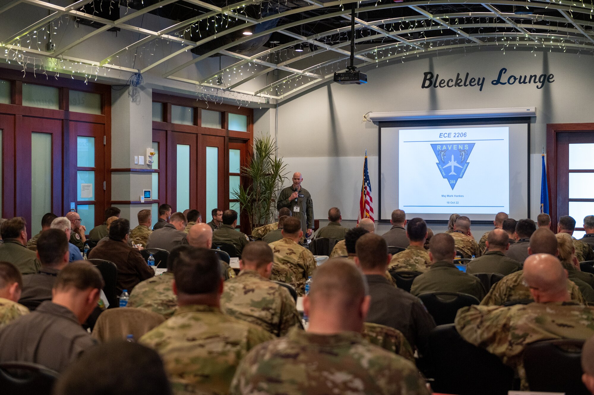 Major Mark Hankes, 344th Air Refueling Squadron director of operations, briefs the KC-46 Weapons Council on Air Mobility Command’s Employment Concept Exercise 22-06 Oct. 18, 2022, at McConnell Air Force Base, Kansas.