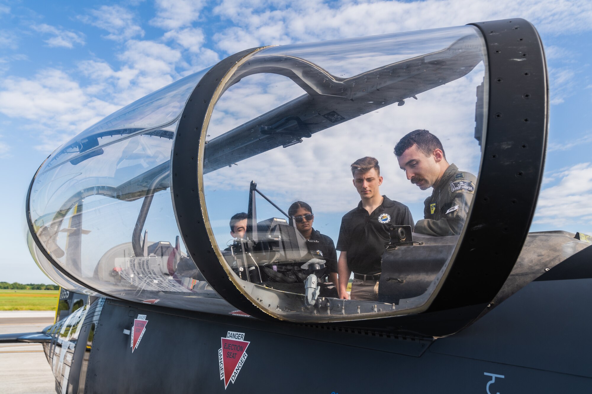 U.S. Air Force Capt. Wil Friedman, 85th Flying Training Squadron instructor pilot, right, speaks to a group of cadets during an Aviation Inspiration Mentorship event at MacDill Air Force Base, Florida, Oct 15, 2022.