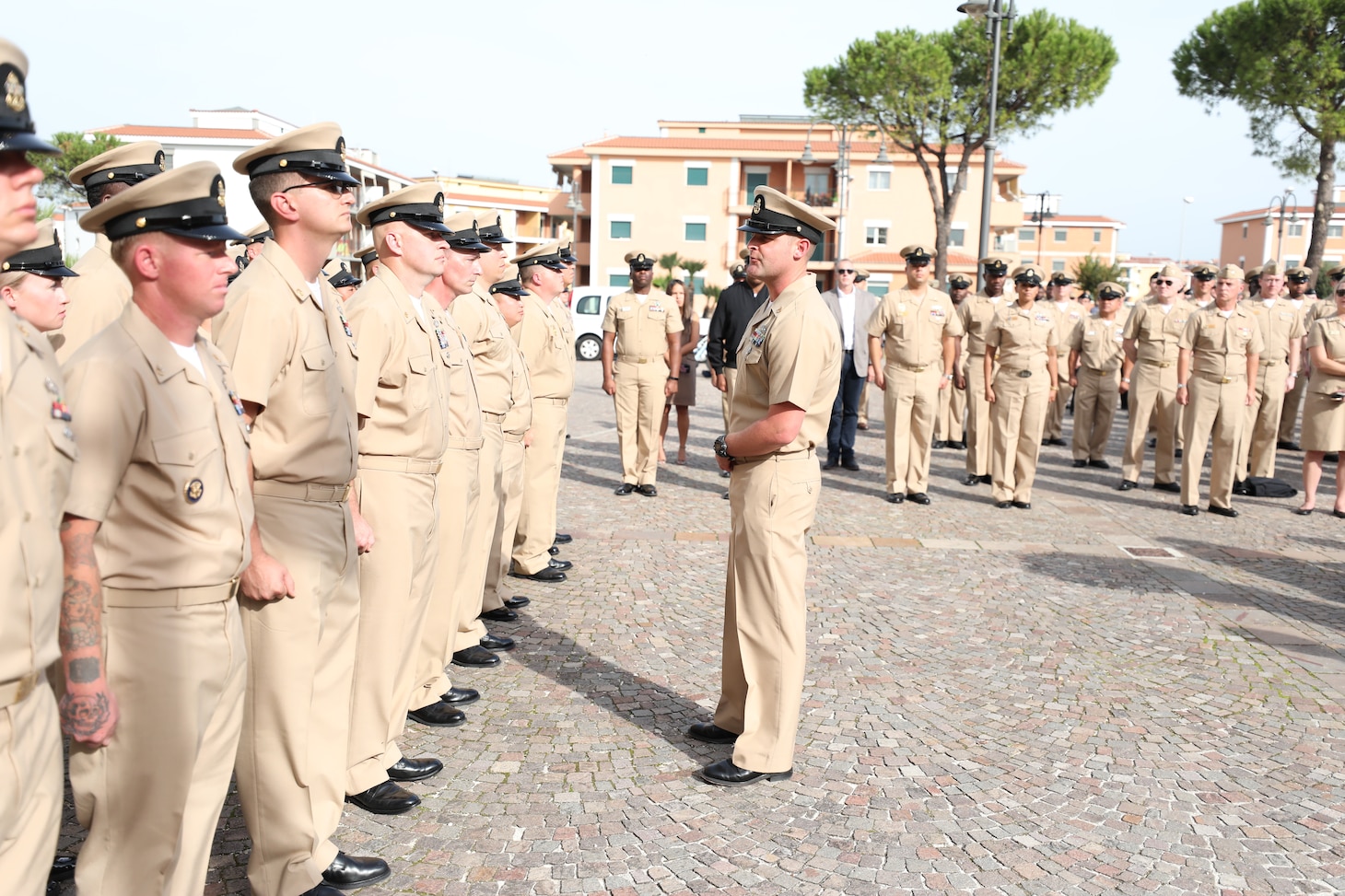 Newly-pinned Chief Petty Officers participate in a Chief Petty Officer pinning ceremony at the Naval Support Activity (NSA) Naples Chapel, Oct. 21, 2022.