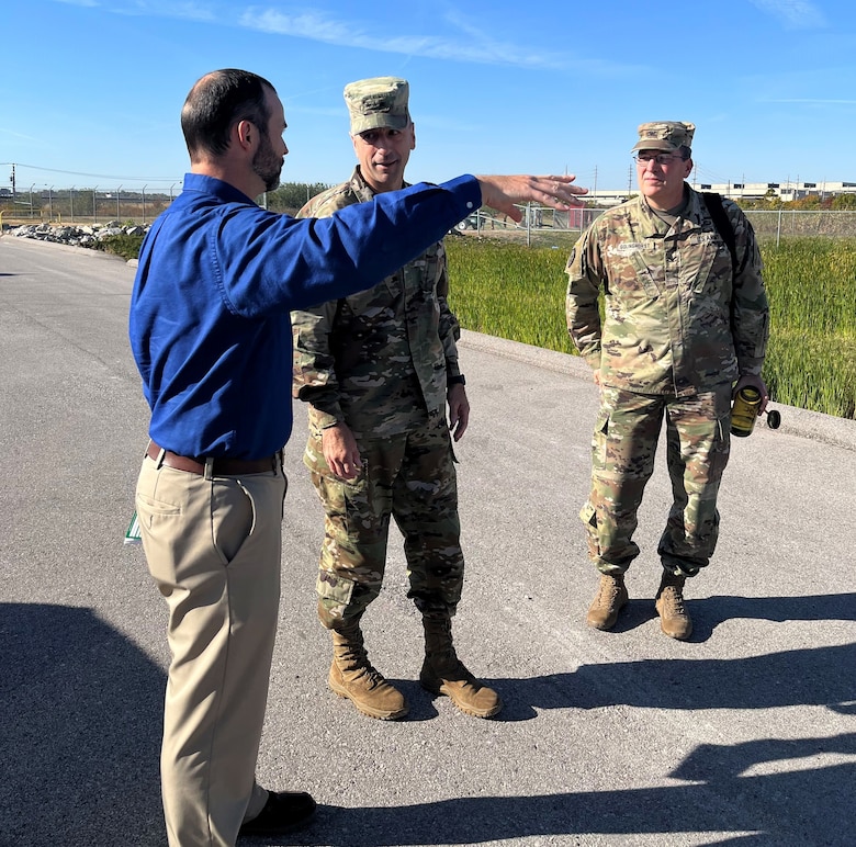 USACE Commanding General Lt. Gen. Scott Spellmon, USACE St. Louis District Commander Col. Kevin Golinghorst and USACE St. Louis District Formerly Utilized Sites Remedial Action Program Manager Phil Moser tour the grounds of Jana Elementary School Oct. 21, as they prepare to expand sampling of the entire property.  Samples will include soil samples and structure surveys both inside and outside the school. Testing will begin Monday, Oct. 24, and preliminary results will be available within two weeks. (US Army Photo by Maj. Grace Geiger)