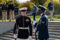 U.S. Marine Corps Cpl. Landon Johnson of the Marine Corps Silent Drill Platoon and U.S. Air Force Senior Airman Christian Porter of the U.S. Air Force Honor Guard Drill Team were high school classmates and reconnected after their performances at the Joint Services Drill Exhibition at the Lincoln Memorial Plaza, Washington, D.C., Oct. 19, 2022. (U.S. Air Force photo by Kristen Wong)