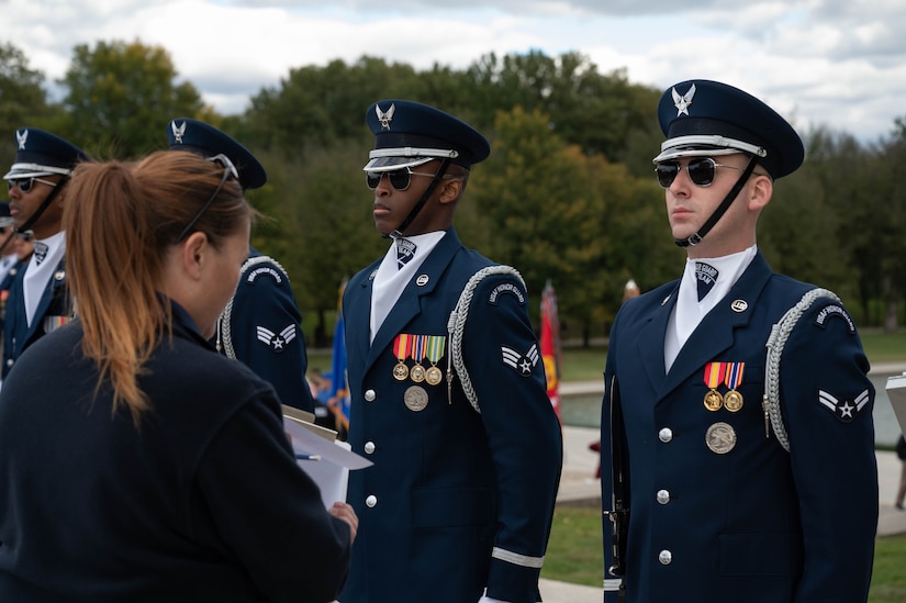 Members of the U.S. Air Force Honor Guard Drill Team undergo uniform inspections before their performance at the Joint Services Drill Exhibition at the Lincoln Memorial Plaza, Washington, D.C., Oct. 19, 2022. The event marked the first “Drill Off” in ten years. (U.S. Air Force photo by Kristen Wong)