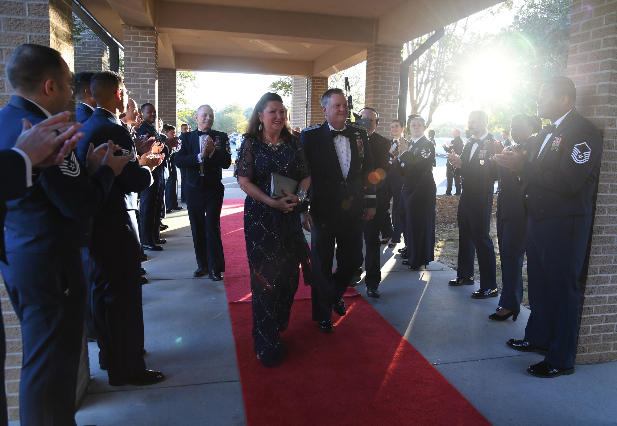 U.S. Air Force retired Lt. Gen. Brad Webb and his wife, Dawna, arrive at the Bay Breeze Event Center for the Order of the Sword Ceremony at Keesler Air Force Base, Mississippi, Oct. 15, 2022