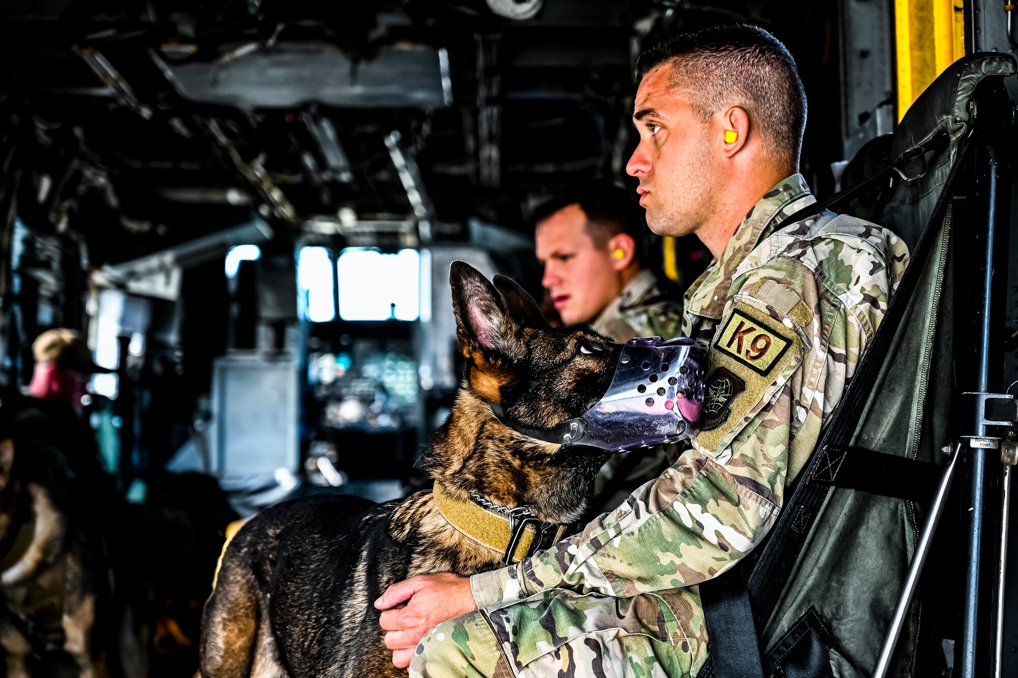 U.S. Air Force Airmen and Military Working Dogs assigned to the 87th Security Forces Squadron practice helicopter familiarization at Joint Base McGuire-Dix-Lakehurst, N.J. on Oct. 16, 2022. Defenders with 87th SFS K-9 section took part in a joint training with Marines to familiarize the Military Working Dogs with the transportation by helicopter. This skillset was developed for the qualification purposes of bomb detection in deployed environments, where certain terrain may only be accessible by air transportation.