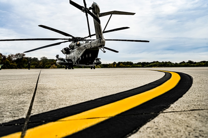 A CH-53E assigned to Marine Aircraft Group 49 prepares to upload at Joint Base McGuire-Dix-Lakehurst, N.J. on Oct. 16, 2022. Defenders with 87th SFS K-9 section took part in a joint training with Marines to familiarize the Military Working Dogs with the transportation by helicopter. This skillset was developed for the qualification purposes of bomb detection in deployed environments, where certain terrain may only be accessible by air transportation.