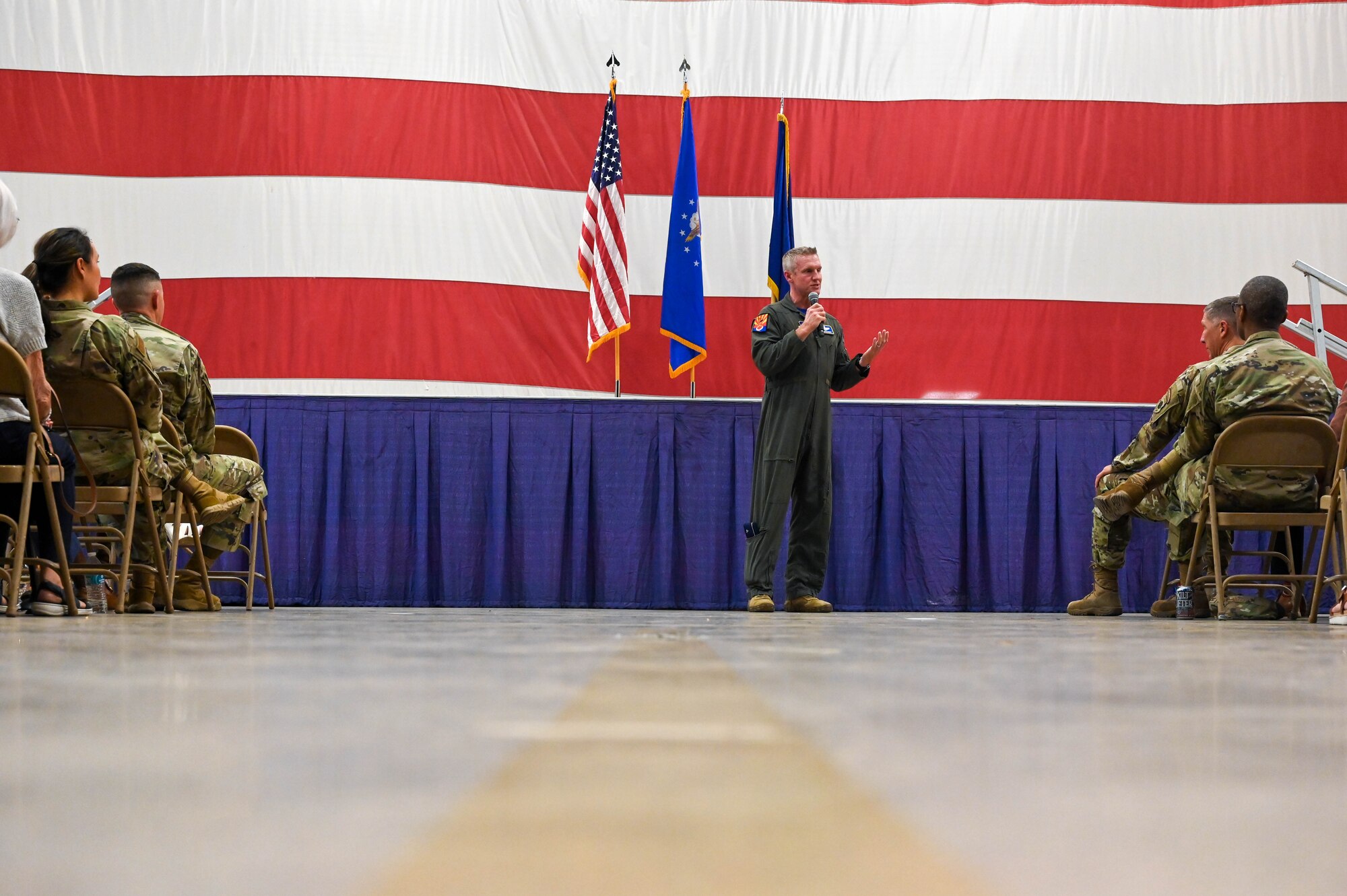 U.S. Air Force Brig. Gen. Jason Rueschoff, 56th Fighter Wing commander, addresses attendees of the 2022 honorary commander induction ceremony, Oct. 14, 2022, at Luke Air Force Base, Arizona.