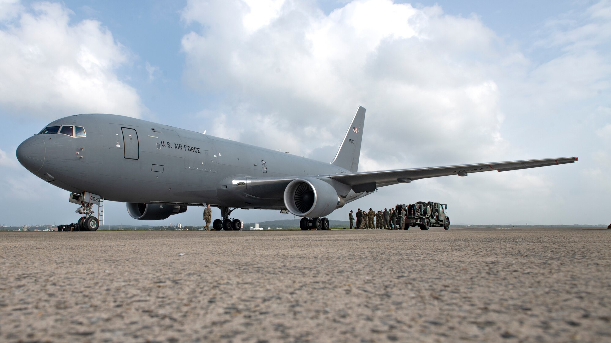 A KC-46A Pegasus assigned to the 22nd Air Refueling Wing is parked on the flightline at Kadena Air Base, Japan, Oct. Oct. 13, 2022. Airmen from the 22nd ARW visited Kadena Air Base to enhance Agile Combat Employment capabilities. (U.S. Air Force photo by Senior Airman Jessi Roth)