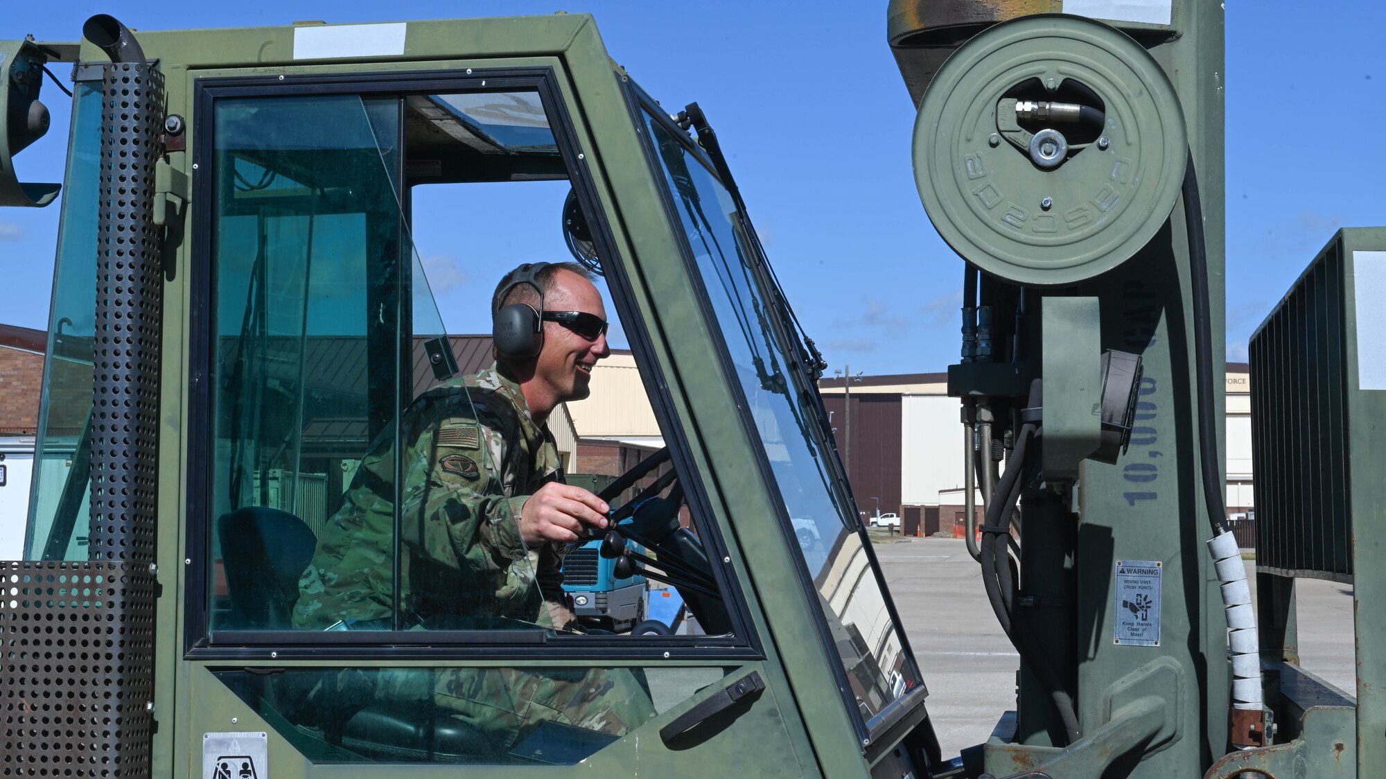 U.S. Air Force Technical Sgt. Kent Sedgwick, 509th Sortie Support section, composite tool kit custodian operates a forklift at Whiteman Air Force Base, Missouri, October 12, 2022. Support is responsible for the serviceability and accountability of about $245 million worth of equipment. (U.S. Air Force photo by Airman 1st Class Hailey Farrell)