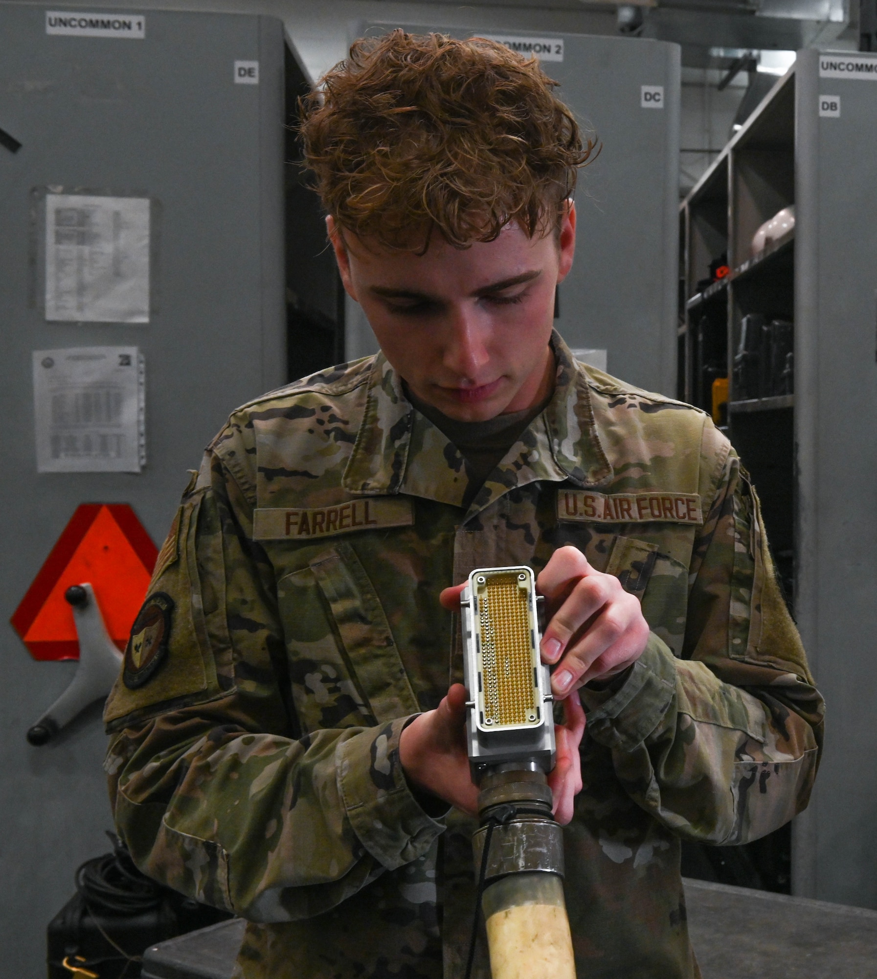 U.S. Air Force Senior Airman William Farrell, 509th Sortie Support section, composite tool kit technician inspects equipment at Whiteman Air Force Base, Missouri, October 12, 2022. Support provides critical equipment needed for maintainers to execute their tasks. (U.S. Air Force photo by Airman 1st Class Hailey Farrell)