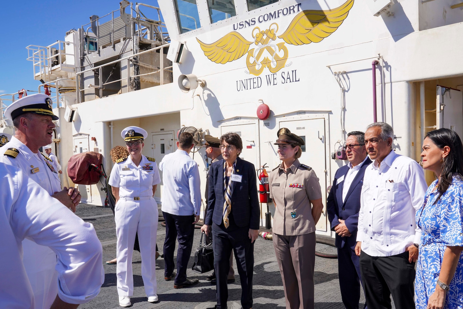 Army Gen. Laura Richardson, commander of U.S. Southern Command, and distinguished visitors tour the flight deck of hospital ship USNS Comfort.