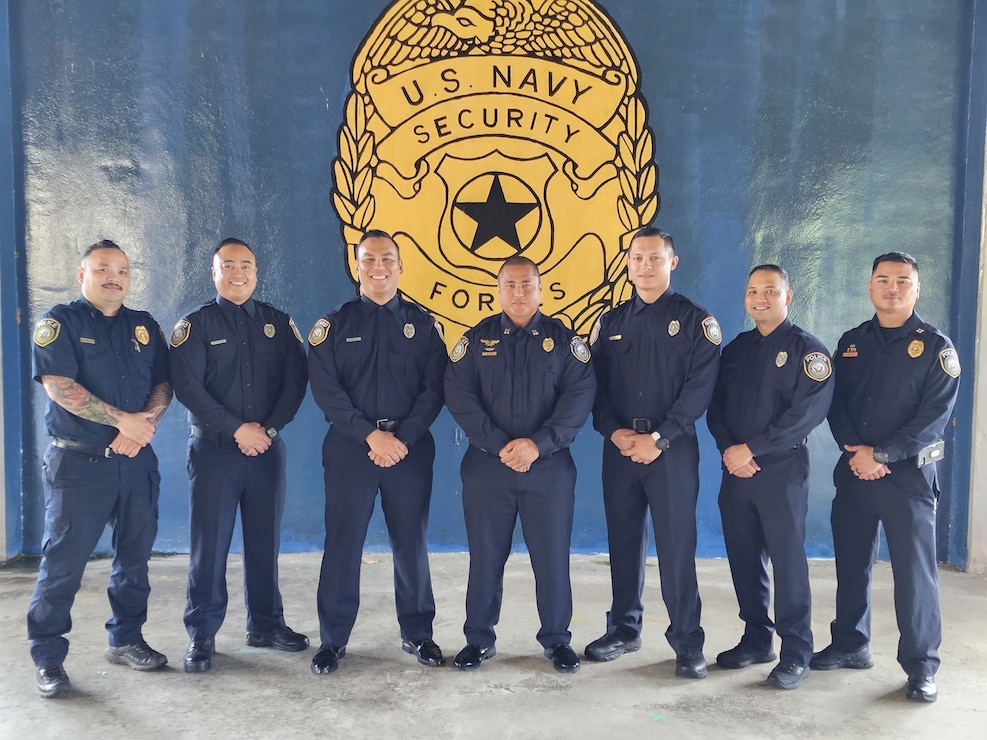 NAVAL BASE GUAM (Oct. 11, 2022) – Graduates from the Navy Security Guard Training Course, Class 09-2022, pose for a group photo with their instructors following a ceremony at the Navy Security Forces Headquarters onboard U.S. Naval Base Guam (NBG), Oct. 7.