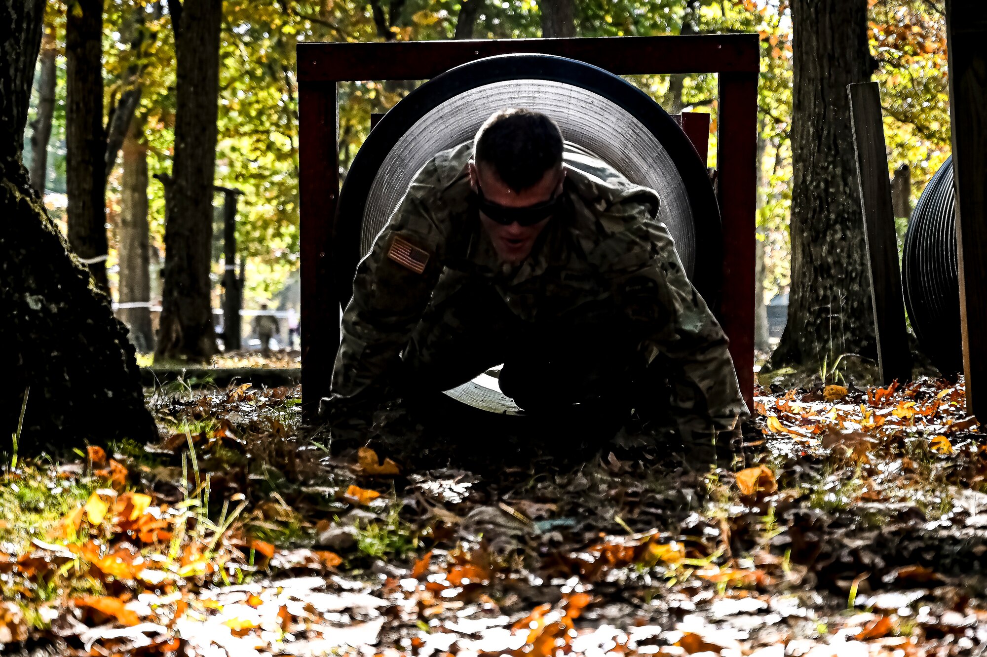 A U.S. Army ROTC Cadet assigned to the U.S. Army Cadet Command 2nd Brigade competes during the Ranger Challenge at Joint Base McGuire-Dix-Lakehurst, N.J. on Oct. 22, 2022.The competition is conducted over two days on a non-tactical course. The mission is to challenge Cadets' mental and physical toughness and to develop leadership while fostering teamwork and esprit-de-corps. Teams participate in nine graded events, each team is awarded points based on how well they perform in each event. The best team in each event is awarded a trophy for being the first, second, and third place teams. The number one team is The Ranger Challenge Winner for that year.