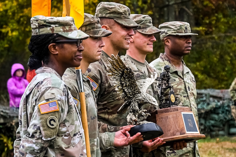 U.S. Army ROTC Cadets assigned to the U.S. Army Cadet Command 2nd Brigade accept awards for placing first overall during the Ranger Challenge at Joint Base McGuire-Dix-Lakehurst, N.J. on Oct. 23, 2022.The competition is conducted over two days on a non-tactical course. The mission is to challenge Cadets' mental and physical toughness and to develop leadership while fostering teamwork and esprit-de-corps. Teams participate in nine graded events, each team is awarded points based on how well they perform in each event. The best team in each event is awarded a trophy for being the first, second, and third place teams. The number one team is The Ranger Challenge Winner for that year.