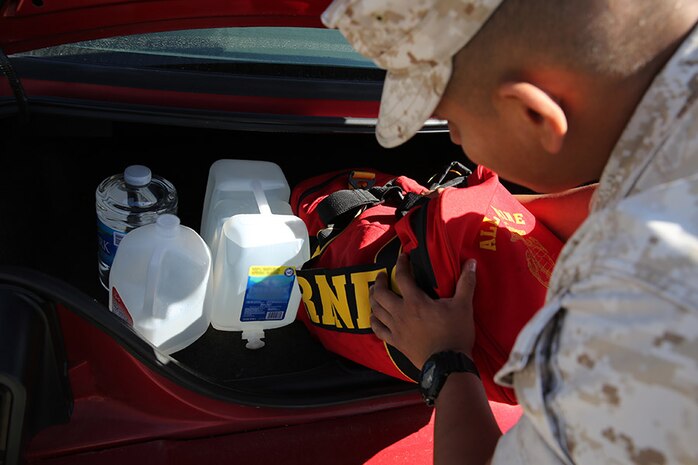 Ready Marine Corps- Marine packing up car