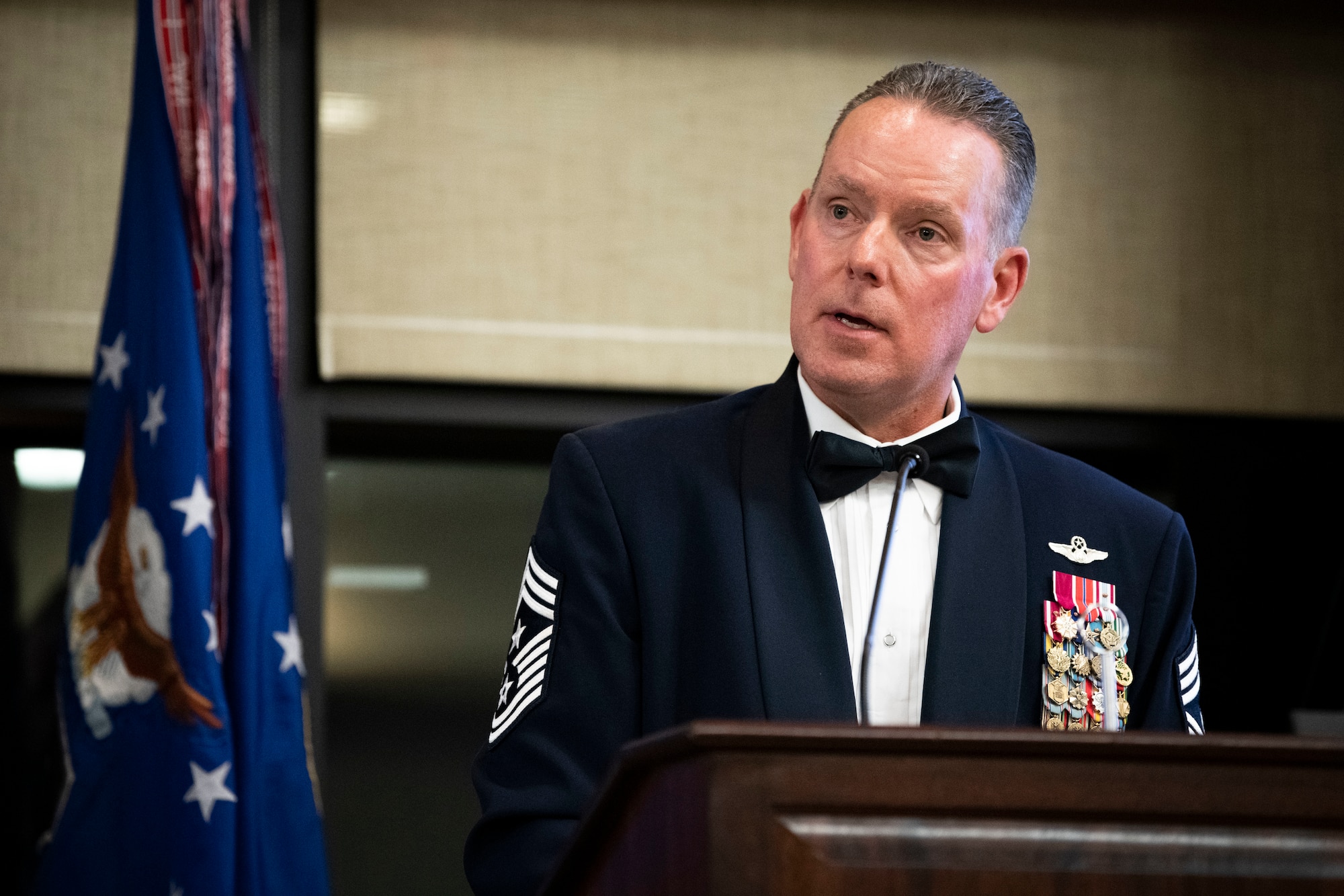 U.S. Air Force Chief Master Sgt. Cory Olson, Air Force Special Operations Command command chief, delivers a speech during an Order of the Sword ceremony at Keesler Air Force Base, Mississippi, Oct. 15, 2022.