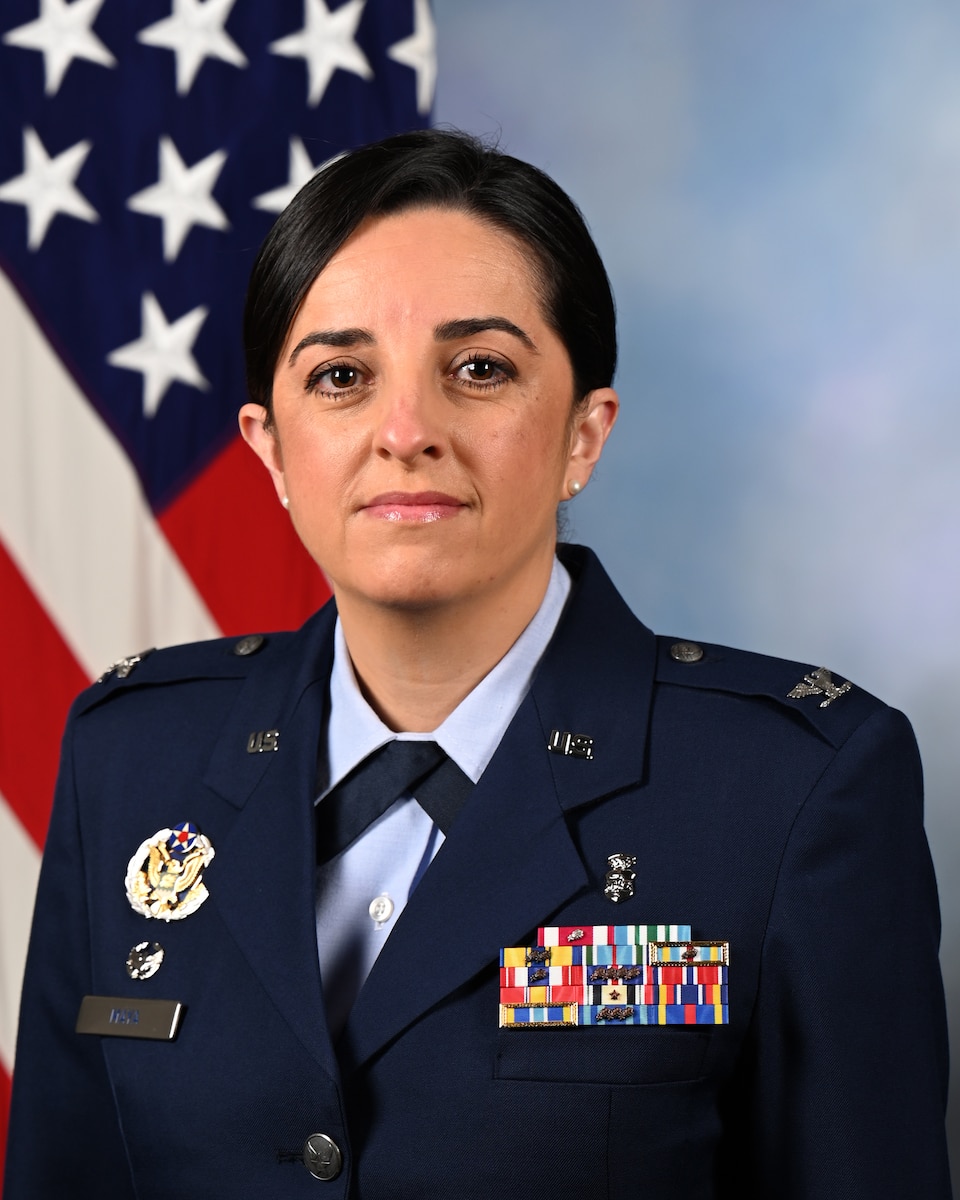 U.S. Air Force Col. Luz Maya poses for her official portrait in the Army portrait studio at the Pentagon in Arlington, Va. April 08, 2022.