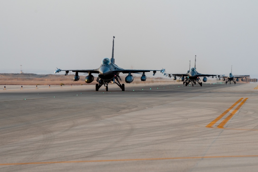 A group of F-16 Fighting Falcon aircraft arrive at Prince Sultan Air Base, Kingdom of Saudi Arabia, from the 20th Fighter Wing at Shaw Air Force Base, South Carolina. While assigned to PSAB, the 77th Expeditionary Fighter Squadron mission is to project combat airpower across AFCENT’s area of responsibility, supporting personnel, improving force movement, and showing U.S. and partner nations resolve in the region. (U.S. Air Force photo by Staff Sgt. Shannon Bowman)