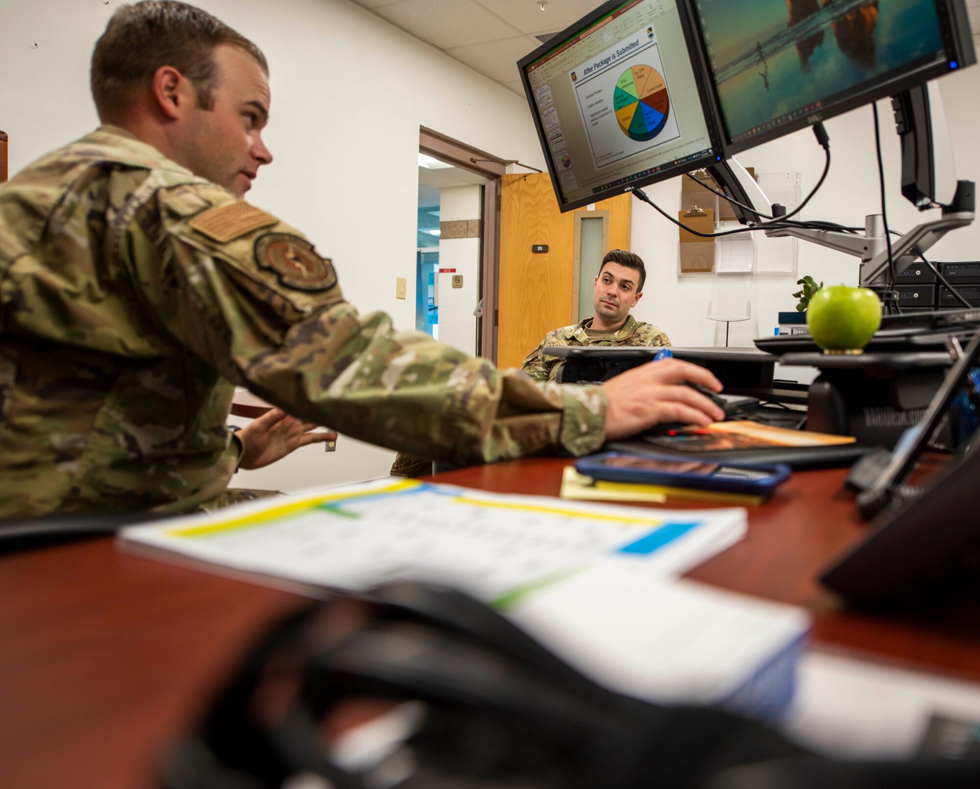 Airmen development advisor talks to individual