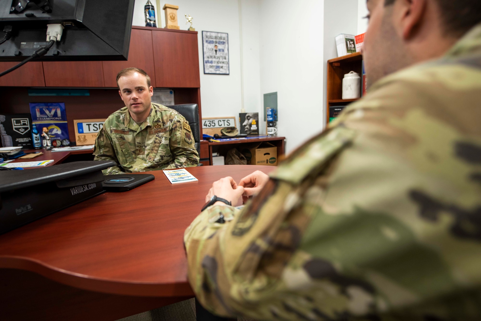 Airmen development advisor talks to individual