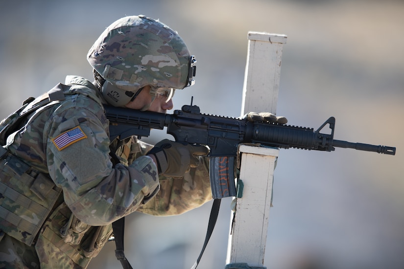 Spc. Cipriano Spier with the 204th Maneuver Enhancement Brigade engages targets during the Army rifle qualification as part of the Utah National Guard Best Warrior Competition at Camp Williams, Utah, Oct. 17, 2022.