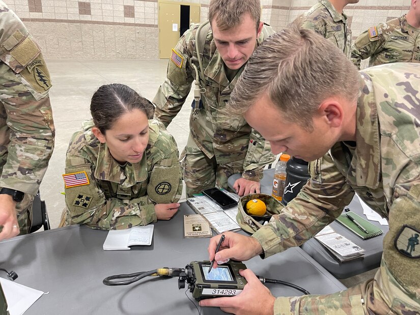 Utah Army National Guard Staff Sgt. Andrea Chica of 97th Aviation Troop Command,  learns how to use a SINCGARS radio as part of theUtah National Guard Best Warrior Competition,Oct. 16, 2022, at Camp Williams, Utah.
