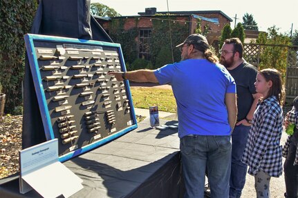 IMAGE: On Oct. 14, Naval Surface Warfare Center Dahlgren Division hosted its very first Dahlgren Downtown event at The Old Silk Mill in Downtown Fredericksburg. In addition to the science, technology, engineering and math displays, community members were able to view a number of Dahlgren historical artifacts.