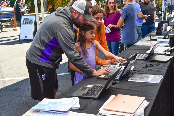 IMAGE: On Oct. 14, Naval Surface Warfare Center Dahlgren Division hosted its very first Dahlgren Downtown event at The Old Silk Mill in Downtown Fredericksburg. In addition to the science, technology, engineering and math displays, community members were able to view a number of Dahlgren historical artifacts.