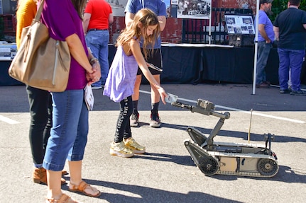 IMAGE: On Oct. 14, Naval Surface Warfare Center Dahlgren Division hosted its very first Dahlgren Downtown event at The Old Silk Mill in Downtown Fredericksburg. In addition to the science, technology, engineering and math displays, community members were able to view a number of Dahlgren historical artifacts.