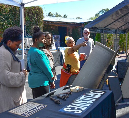 IMAGE: On Oct. 14, Naval Surface Warfare Center Dahlgren Division hosted its very first Dahlgren Downtown event at The Old Silk Mill in Downtown Fredericksburg. In addition to the science, technology, engineering and math displays, community members were able to view a number of Dahlgren historical artifacts.