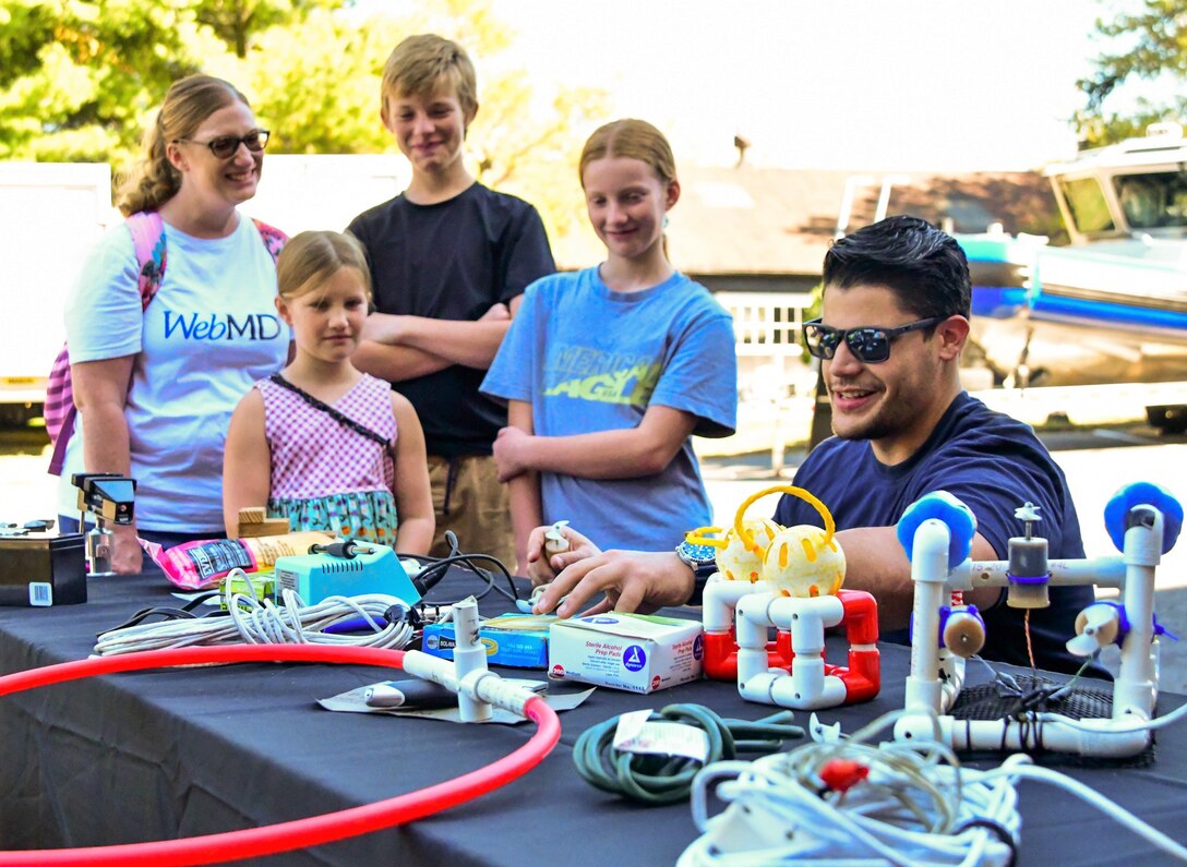 IMAGE: On Oct. 14, Naval Surface Warfare Center Dahlgren Division hosted its very first Dahlgren Downtown event at The Old Silk Mill in Downtown Fredericksburg. In addition to the science, technology, engineering and math displays, community members were able to view a number of Dahlgren historical artifacts.
