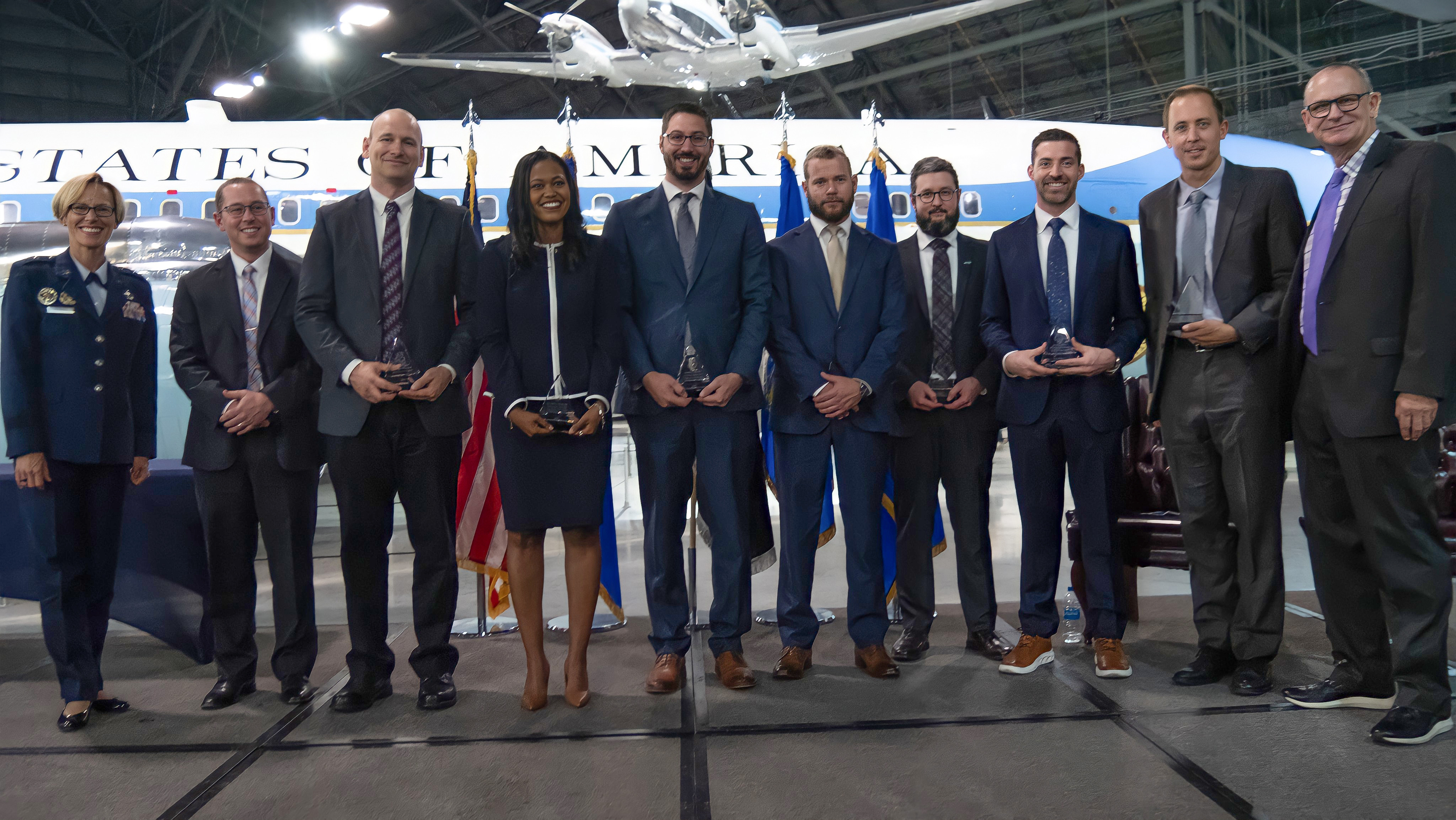 Air Force Research Laboratory Commander Maj. Gen. Heather Pringle, far left, and Chief Technology Officer Dr. Tim Bunning, far right, pose with the 2022 Early Career Award winners, from left to right, Dr. Nicholas Glavin, Dr. Daniel Dault, Dr. Candice Hatcher-Solis, Dr. Sean McDaniel, Dr. Andrew Metcalf, Dr. Sean Donegan, Dr. Joel Bixler and Dr. Stuart Benton at the National Museum of the U.S. Air Force, Oct. 12, 2022, during the 2022 AFRL Fellows and Early Career Awards ceremony. The Air Force Research Laboratory honored scientists and engineers for outstanding career accomplishments during this annual event. (U.S. Air Force photo / Keith Lewis)