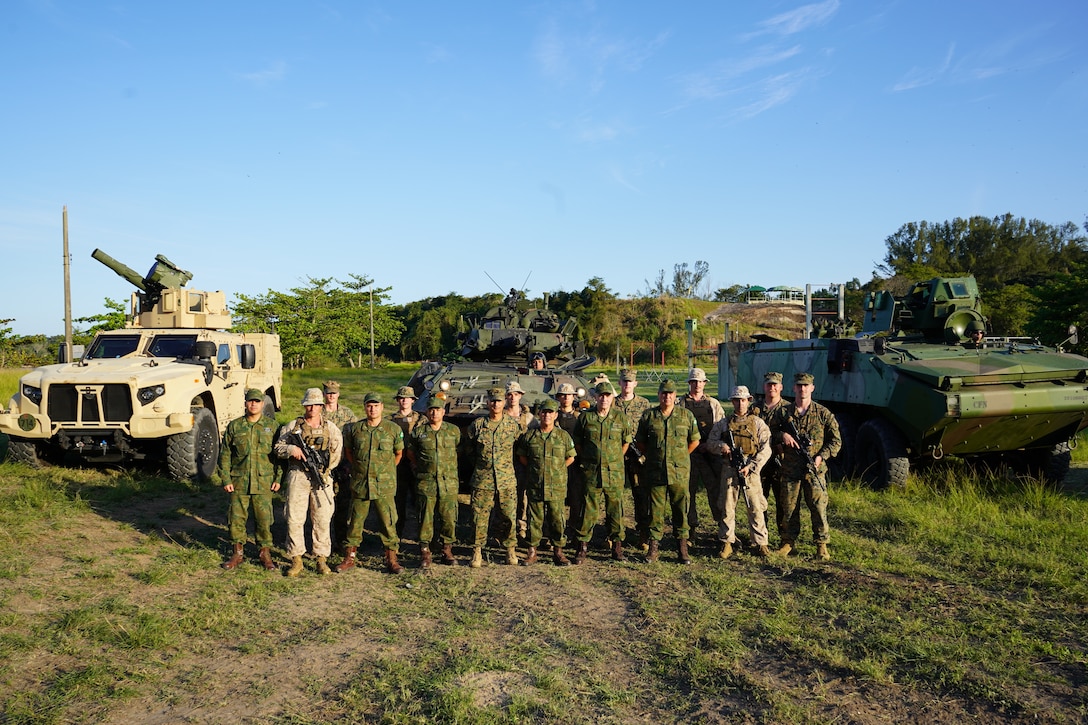 Senior leaders from the Brazilian and United States Marine Corps pose for a photograph with Marines from their respective services following a training evolution on Ilha do Governador Brazilian Marine Corps base, Rio de Janeiro, during Exercise UNITAS LXIII, Sept. 7, 2022. For the last 63 year, UNITAS has developed and sustained relationships that improve the capacity of Marine Forces, South's reemerging and enduring maritime partners to achieve common objectives. Additionally, the military-to-military exchanges foster friendly, mutual cooperation and understanding among participating navies and marine corps.