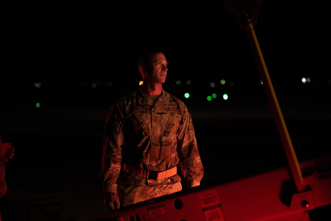 U.S. Air Force Master Sgt. Jason Golden, superintendent, 28th Air Terminal and Passenger Movement, oversees the loading of cargo for a Bomber Task Force operation at Ellsworth Air Force Base, South Dakota, on Oct 14, 2022. These bomber missions are representative of the U.S. commitment to our allies and enhancing regional security. (U.S. Air Force photo by Senior Airman Austin McIntosh)