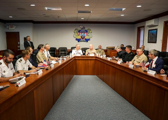 Leadership of the U.S. and French submarine forces speak during a staff talk meeting held at Submarine Force Atlantic onboard Naval Support Activity Hampton Roads, Oct. 11, 2022.