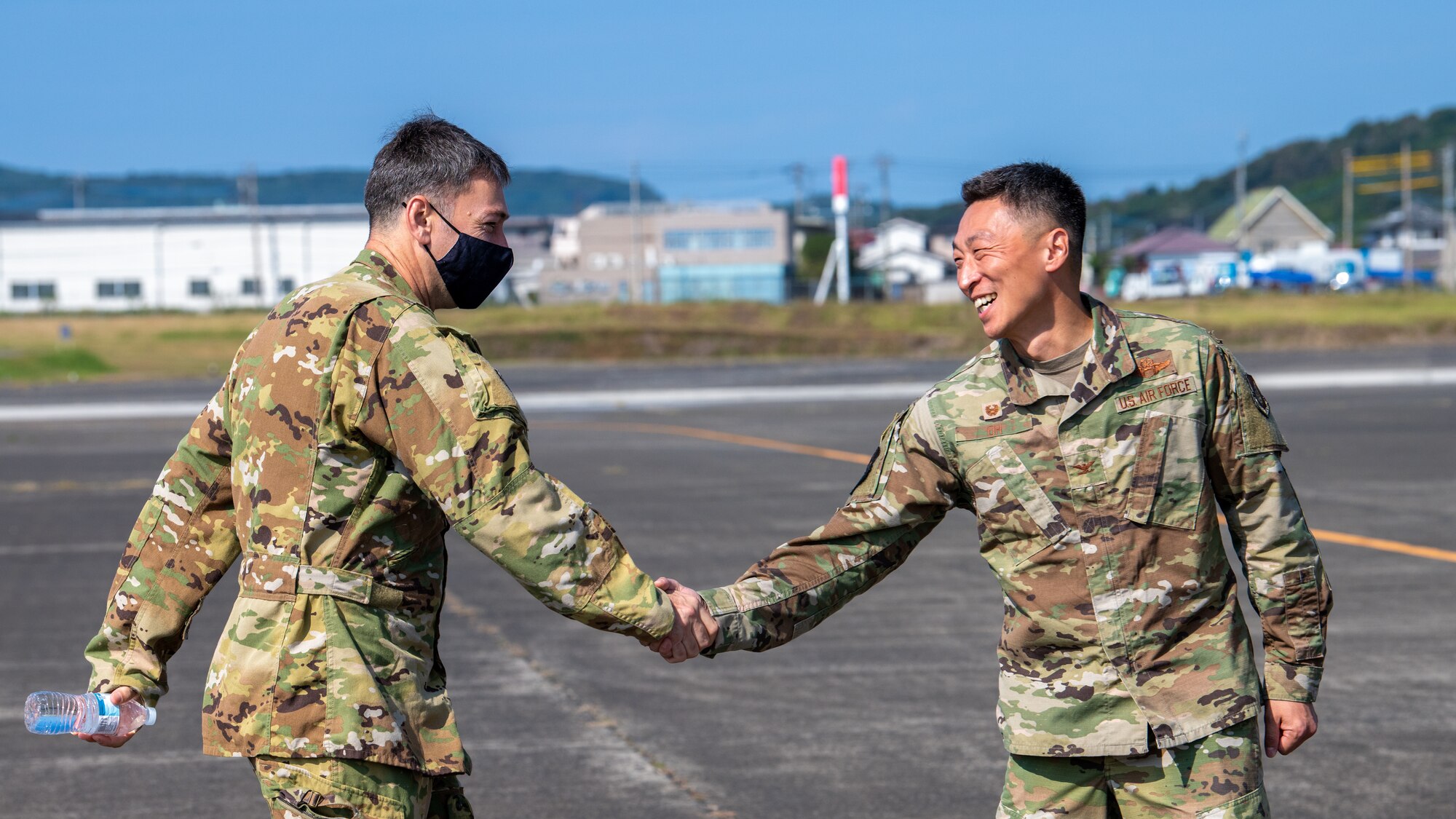Commanders shake hands