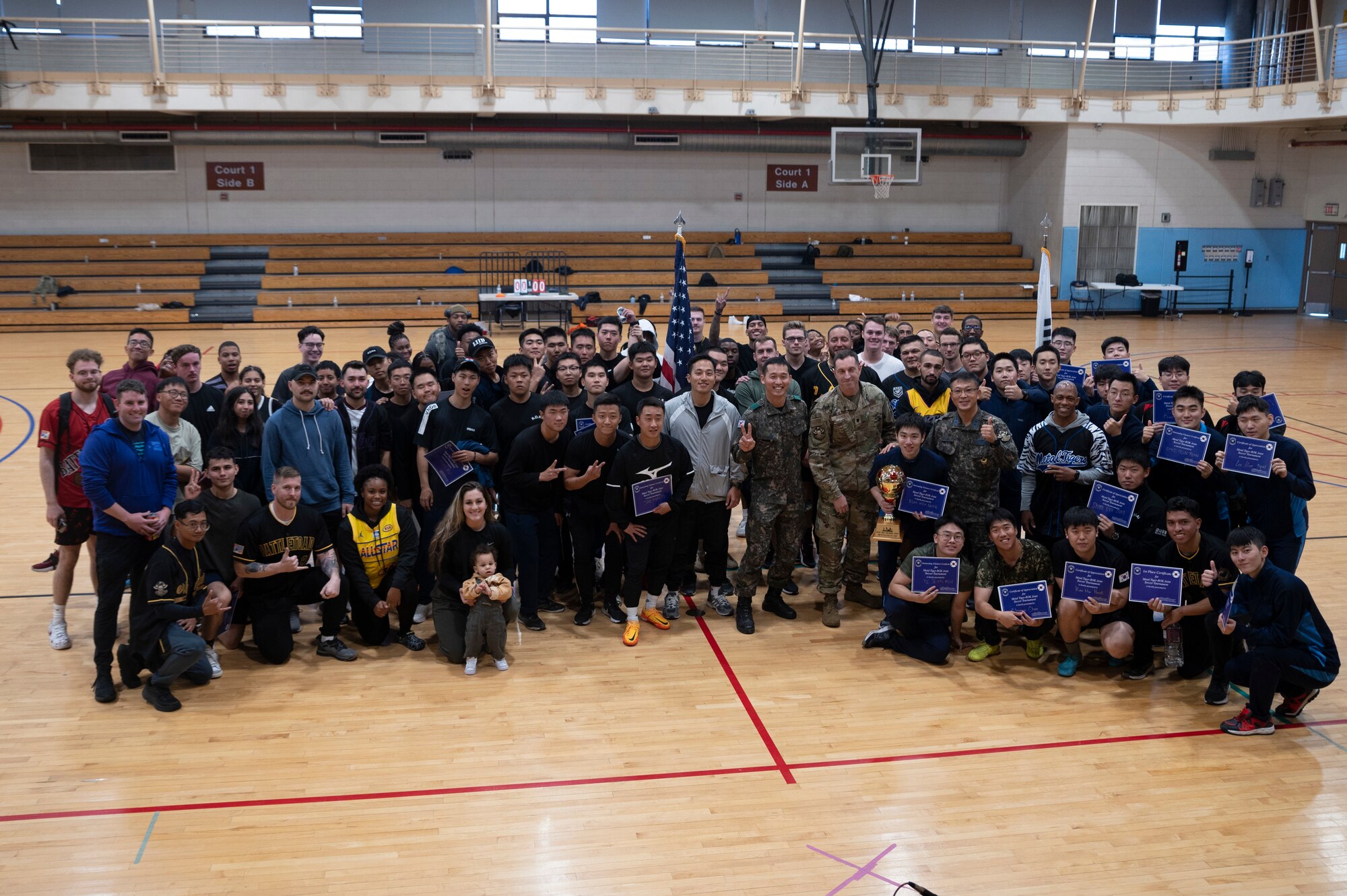 Republic of Korea and U.S. Service members pose for a group photo following a bilateral soccer tournament at Osan Air Base, ROK, Oct. 21, 2022.