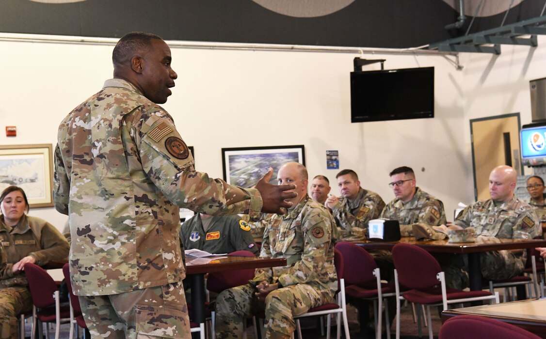 U.S. Air Force Chief Master Sgt. Maurice Williams, left, command chief, Air National Guard speaks to Airmen of the 178th Wing, Ohio National Guard, Oct. 15, 2022, in Springfield, Ohio. Throughout his time at the 178th Wing, Williams continued to emphasize that the work of the Air National Guard always comes back to the people. (U.S. Air National Guard photo by Senior Airman Jillian Maynus).